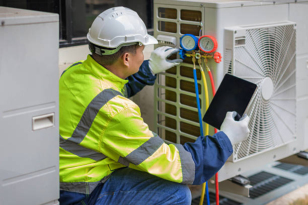 Professional Air Duct Cleaning technician working in Parkville, MO